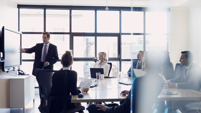 Many people in a conference room