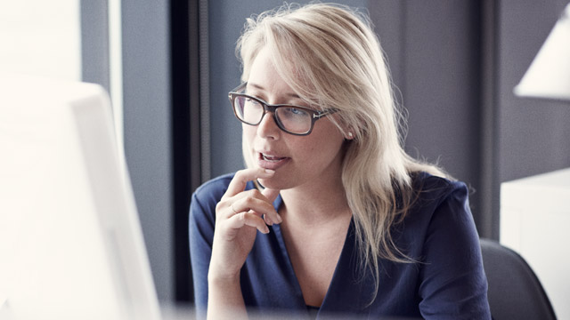 Woman in front of computer SMALL
